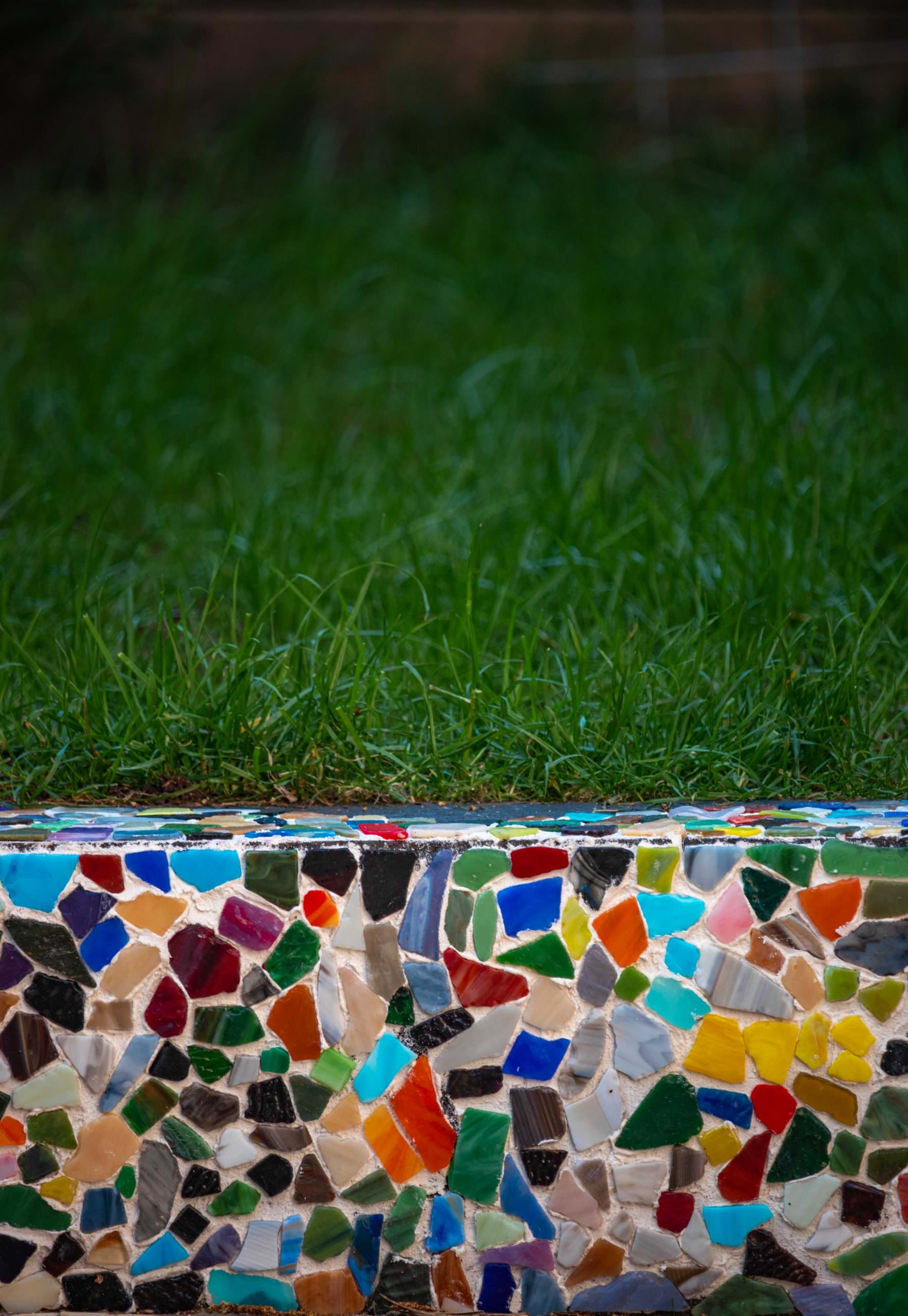 green lawn and colorful mosaic